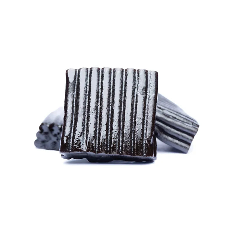 Black salt licorice square-shaped gummies.