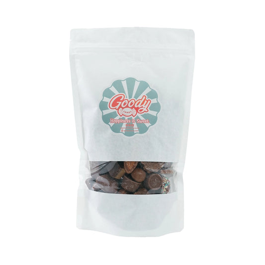 White bag with assorted chocolate candies in various shapes.