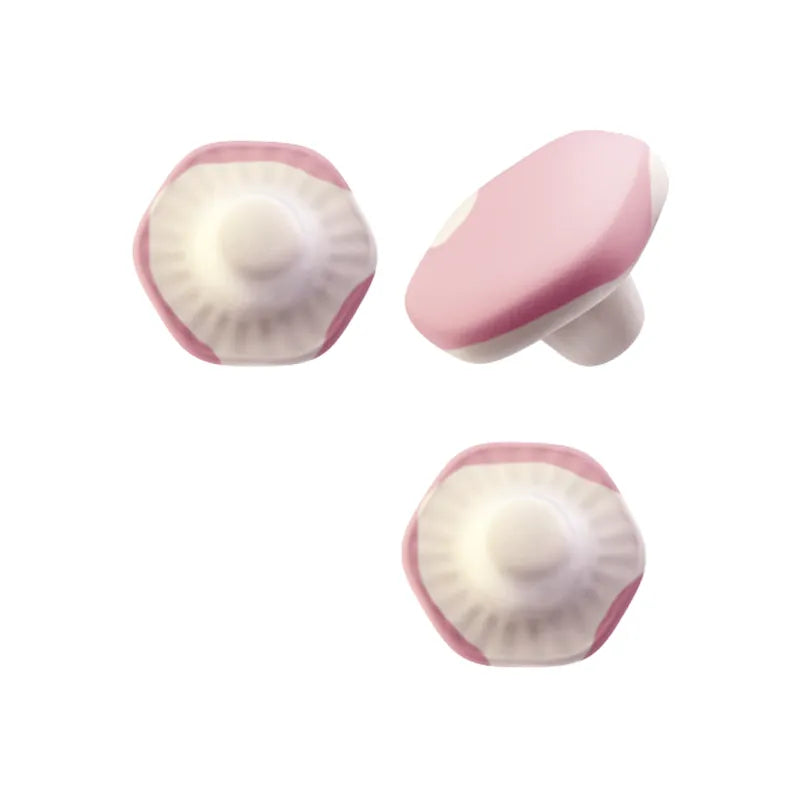 Pink and white mushroom-shaped foam candy.