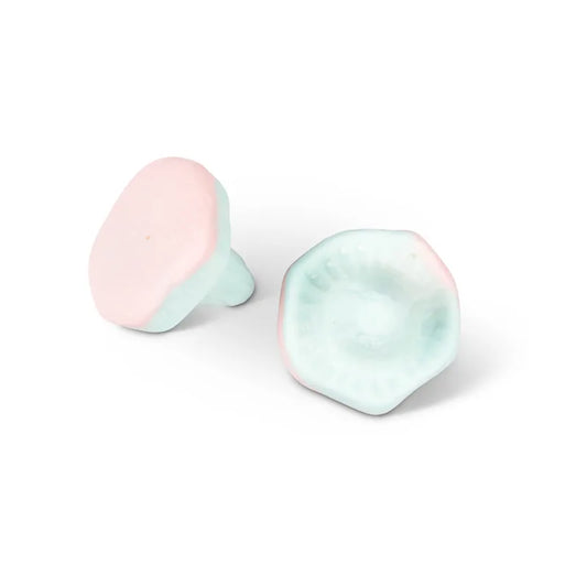 Pink and blue mushroom-shaped foam candy.