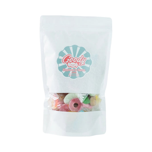 White bag with assorted candies in various color and shapes.