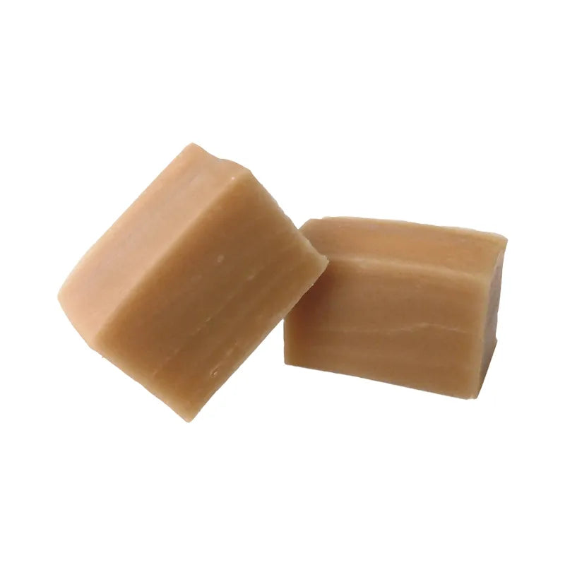 Cream colored fudge cubes.
