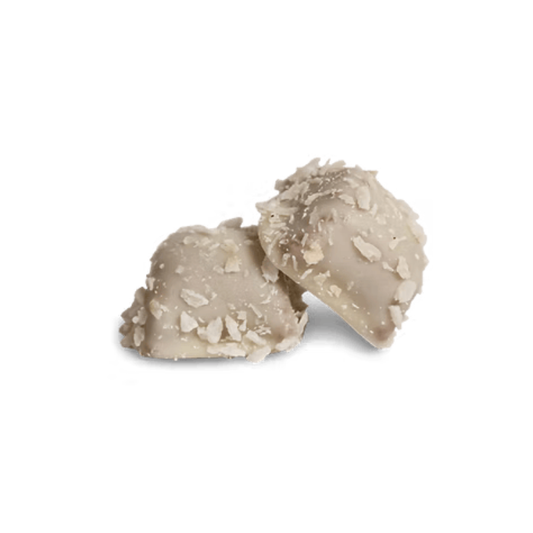 White chocolate balls coated in coconut flakes