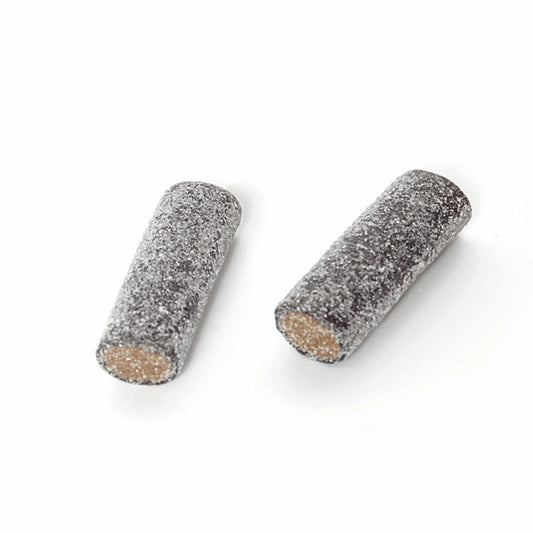 Black and brown salt-coated tube-shaped chewy candy by Toms.